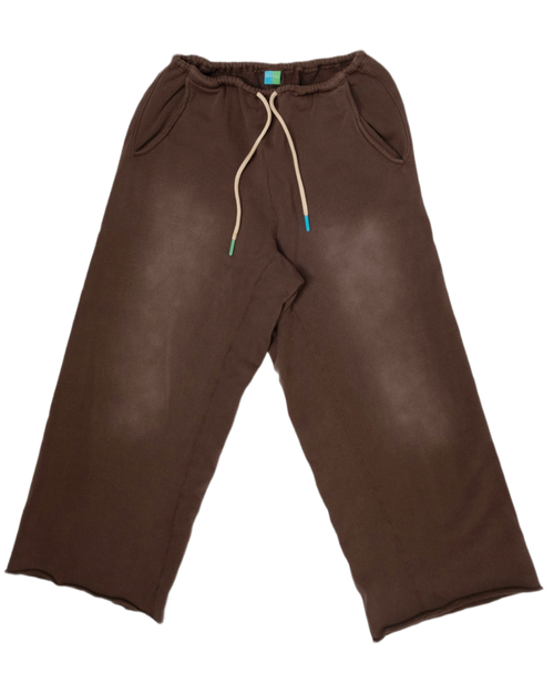 A pair of dark brown wide-leg sweatpants with a cream-colored drawstring and side pockets, laid flat against a white background.