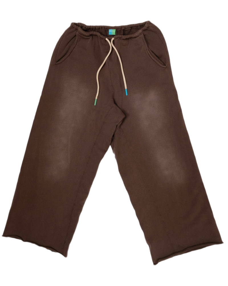 A pair of dark brown wide-leg sweatpants with a cream-colored drawstring and side pockets, laid flat against a white background.