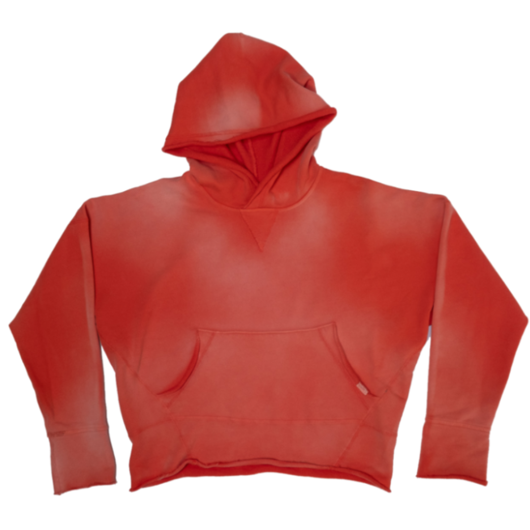 A cropped red hoodie sweatshirt vintage washed with a kangaroo pocket, up and coming female-owned streetwear brand.