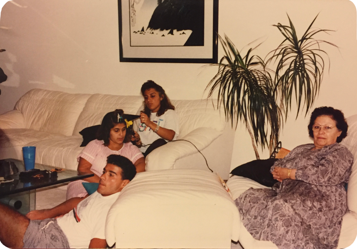 A candid family photograph showing dad, aunt rana, reema, and teta in our aliso viejo living room when they first came to visit us in america.