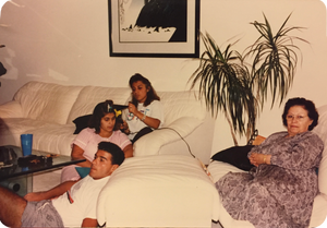 A candid family photograph showing dad, aunt rana, reema, and teta in our aliso viejo living room when they first came to visit us in america.